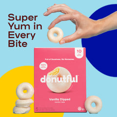 Hand pulling a vanilla donut out of the box.